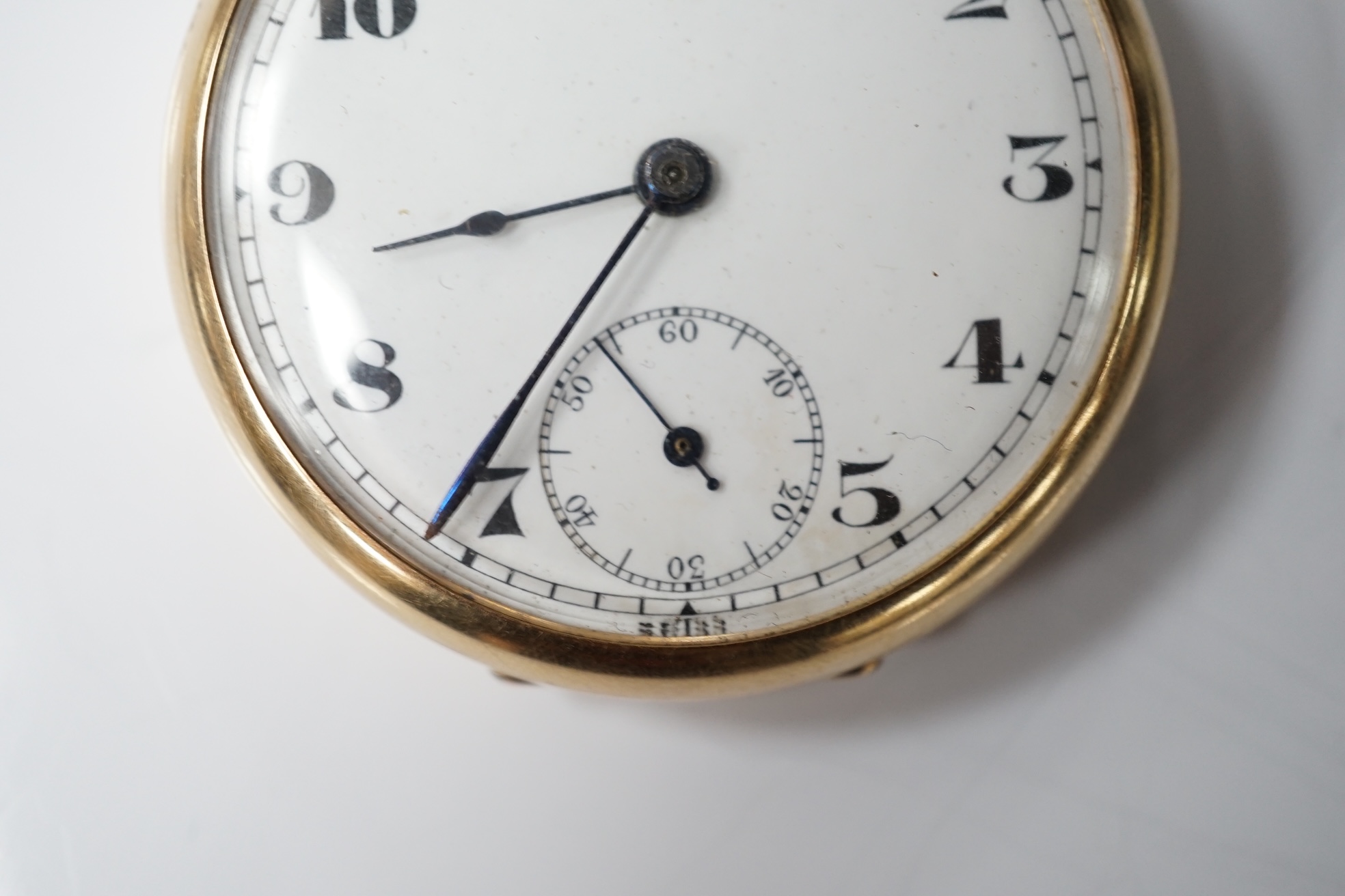 A George V 9ct gold open face pocket watch, with Arabic dial and subsidiary seconds, case diameter 46mm, gross weight 51 grams. Condition - fair